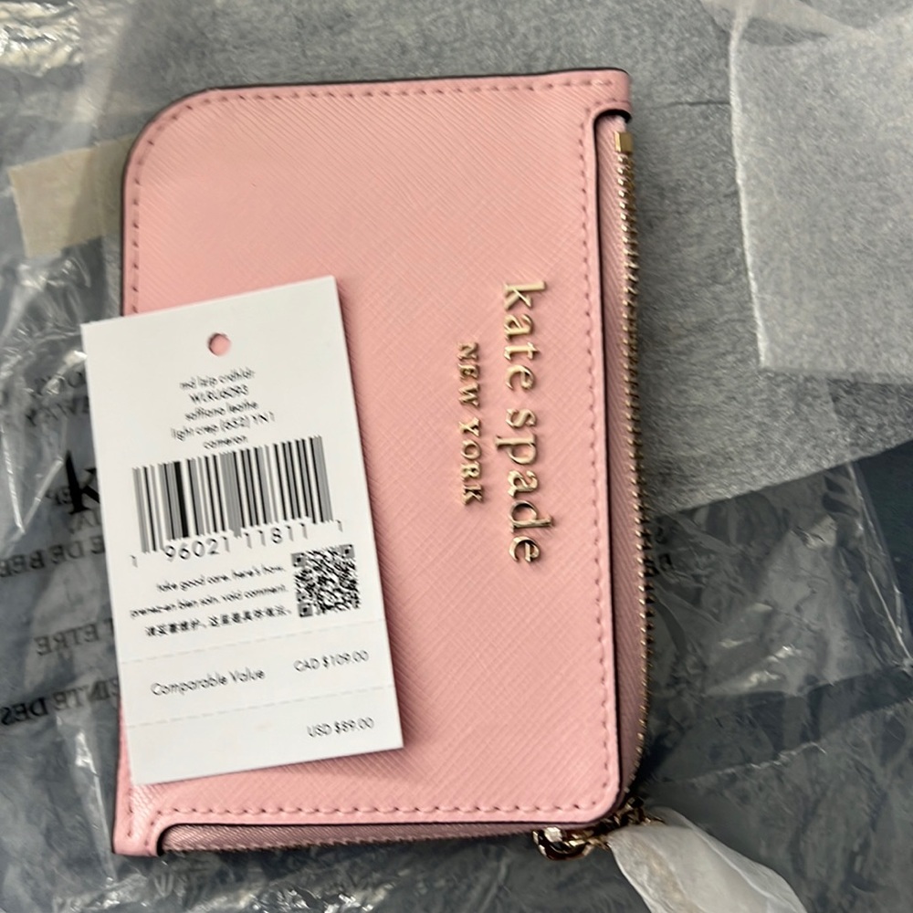 18. NWT KATE SPADE PINK WALLET
